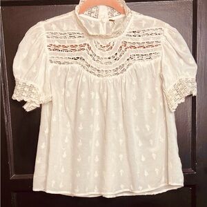 Free People white and cream embroidere top with lace details. Size M.